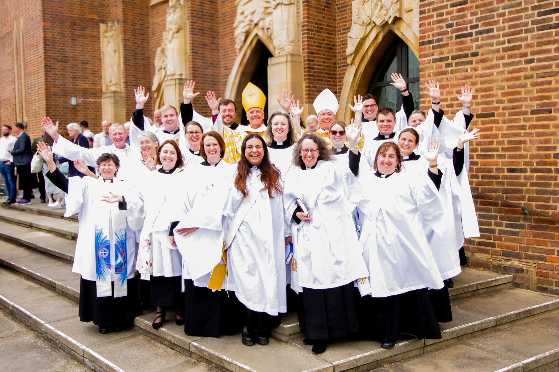 The group of newly ordained deacons on the the steps of Guildford Cathedral with the Bishops of Guidford and Dorking