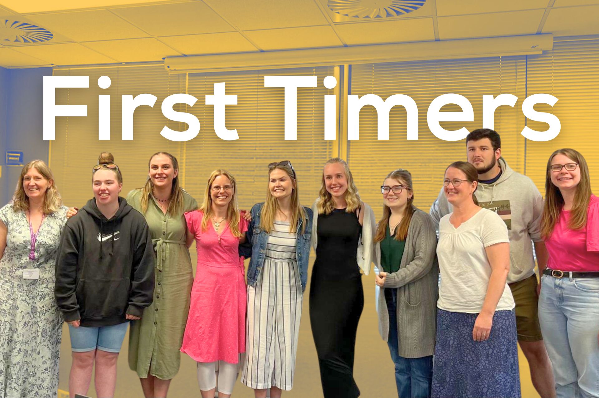 9 First Timer graduates stand with their course leader, Emma Coy