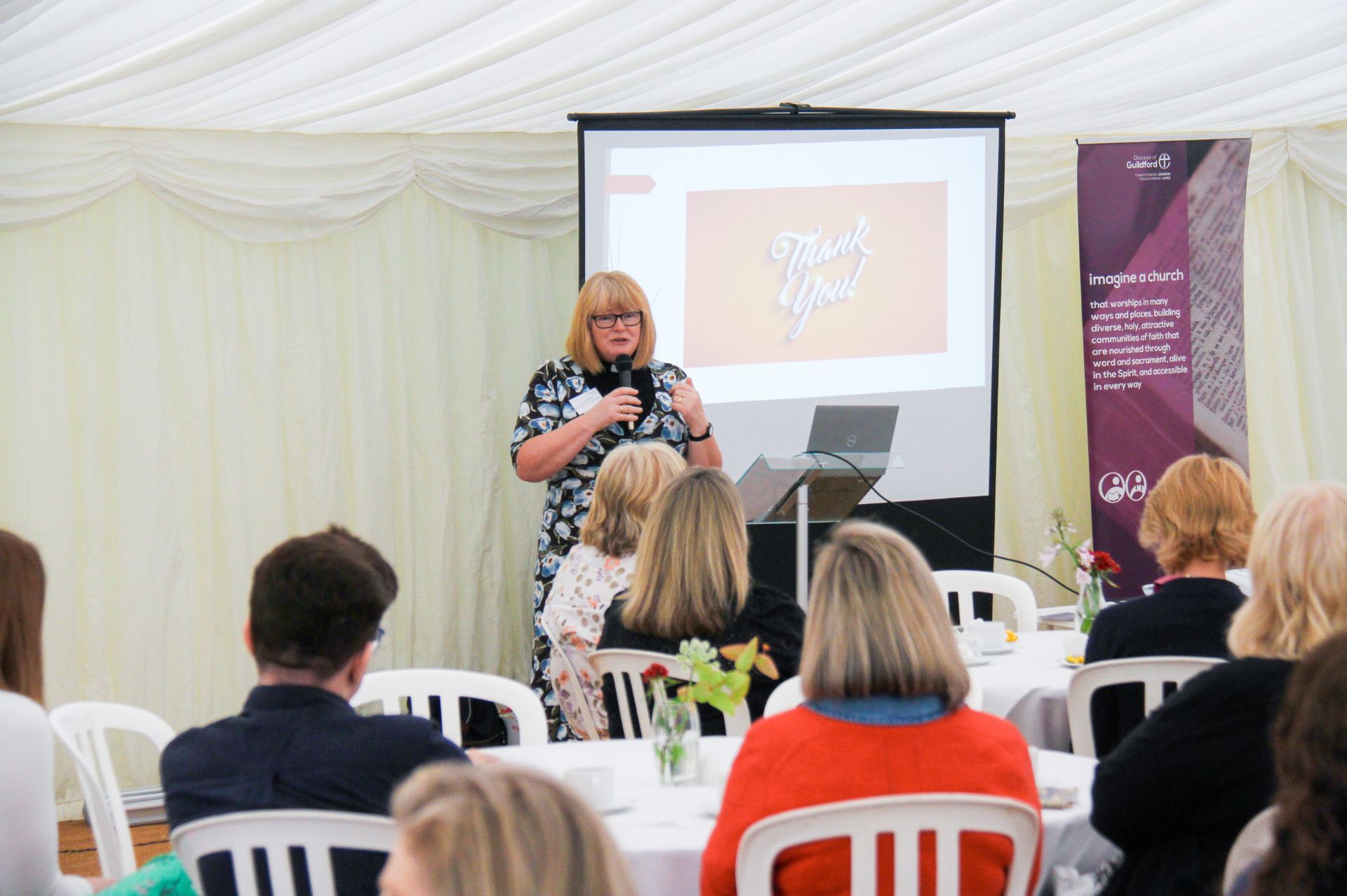 Jo Lamberth addresses attendees of the Parish Administrators Tent Week event