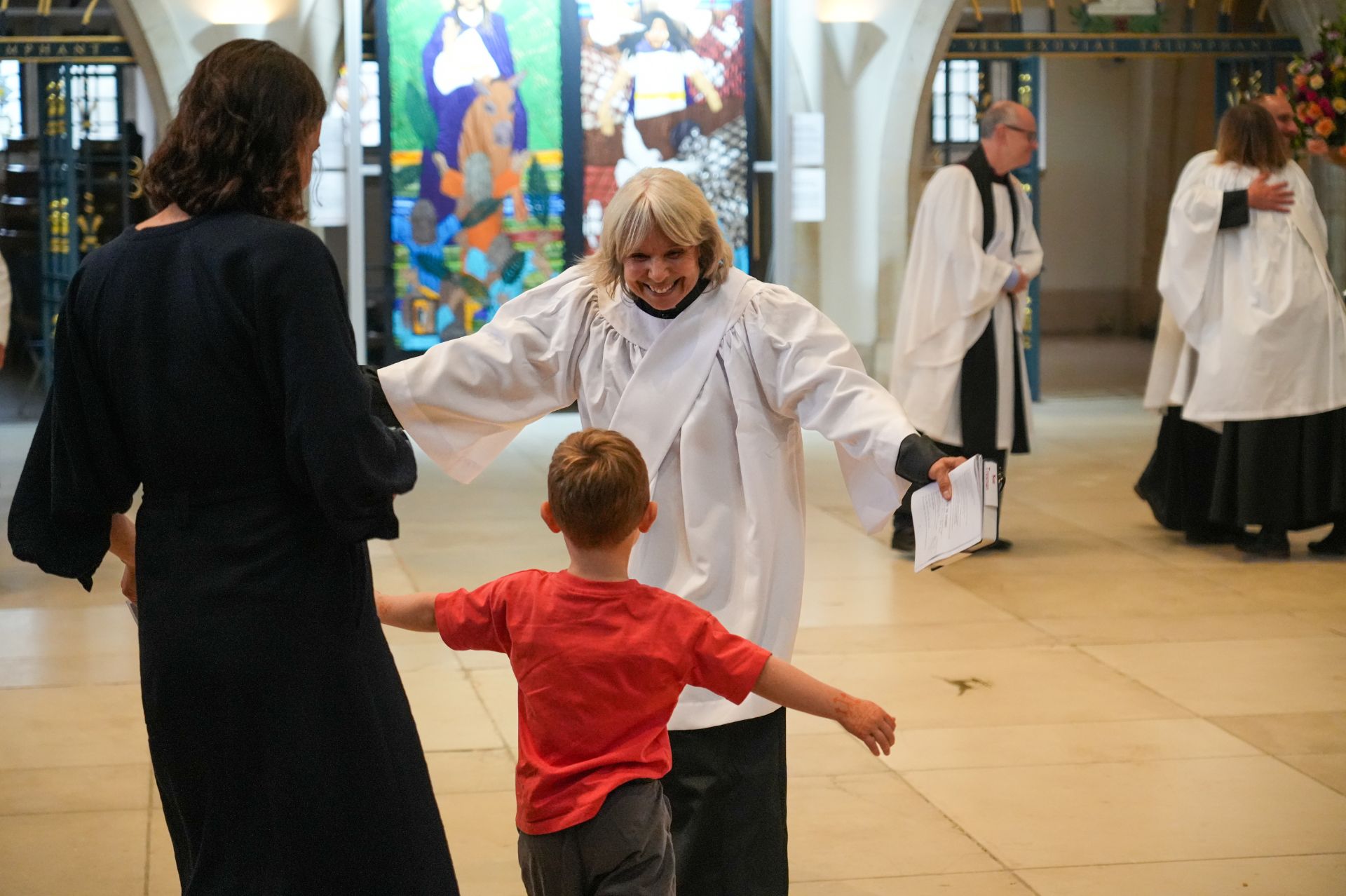 Revd Sue Tresman greets her grandson having just been ordained