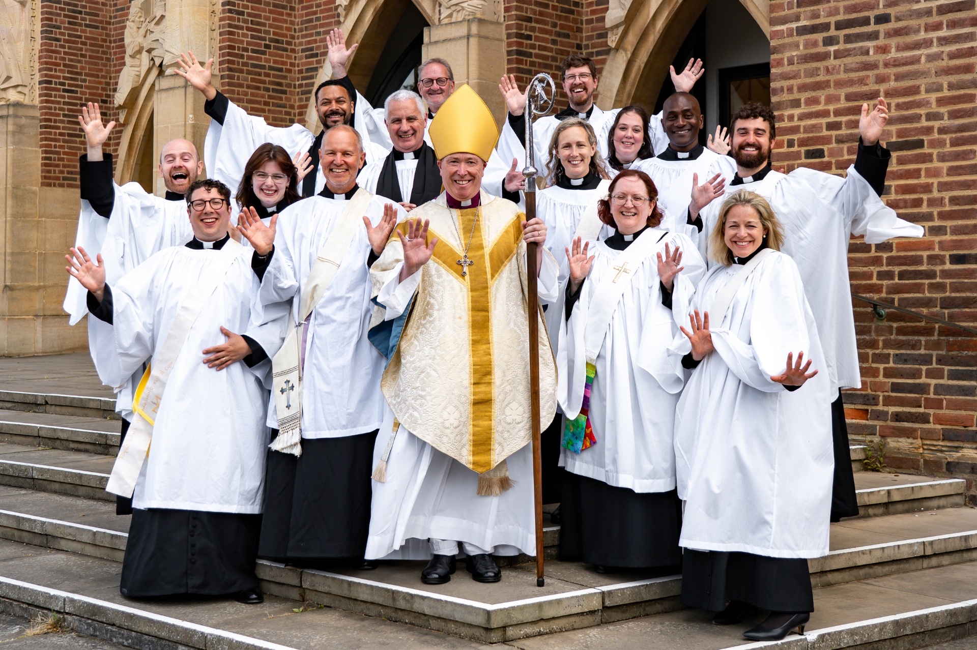 The latest deacons in the diocese standing with Bishop Paul